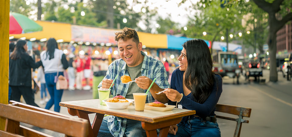 latino couple at a street fair in nyc