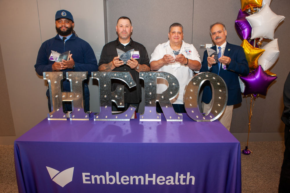 Honorees accepting their awards at the 12th Annual Heroes Of Labor Awards.