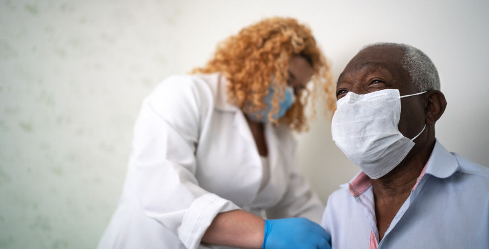 man getting vaccine