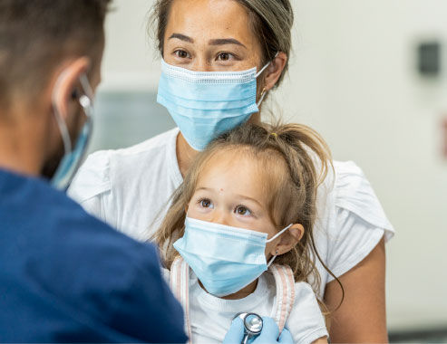 mom and daughter in masks