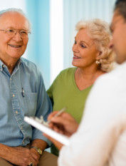 Older couple meeting with a doctor