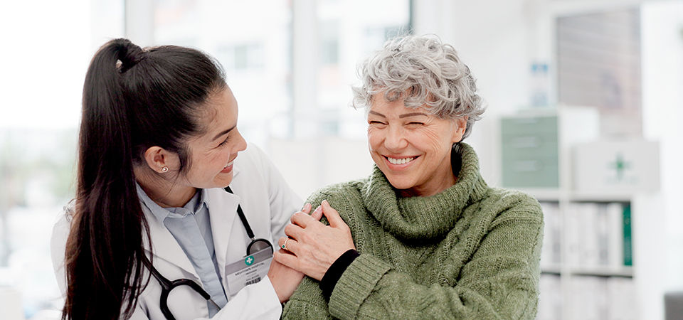 healthcare providers with happy patient