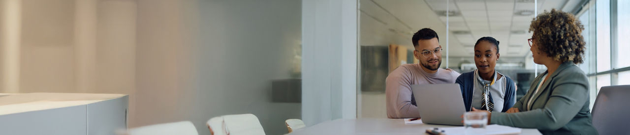 group of brokers at desk