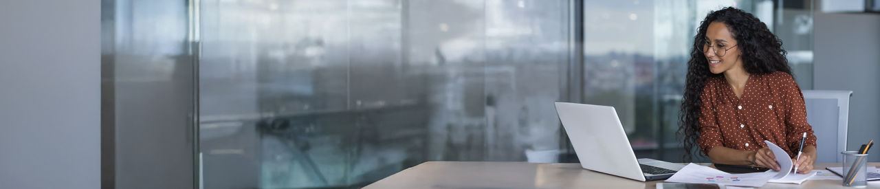 broker lookung at a computer