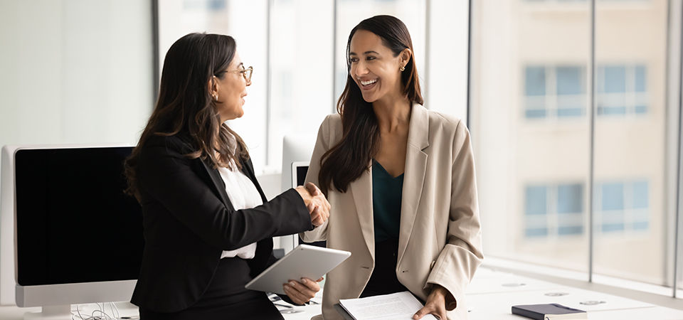 colleagues handshaking 
