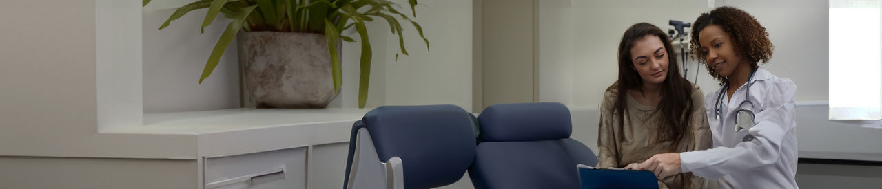 healthcare provider with patient in office