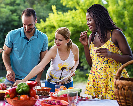 group of people eating healthy outdoors