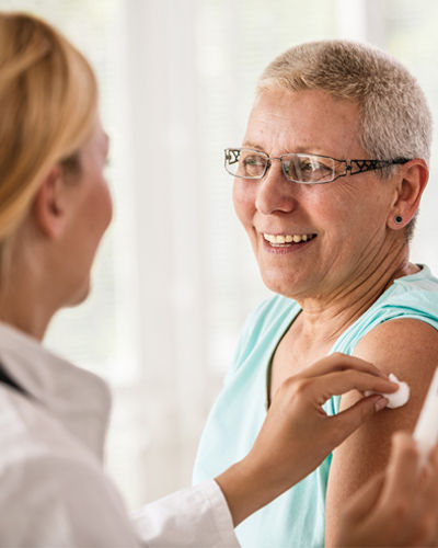 women getting vaccine