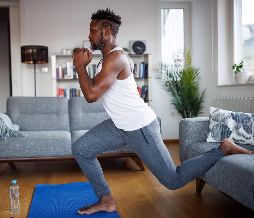 African-American man exerising at home