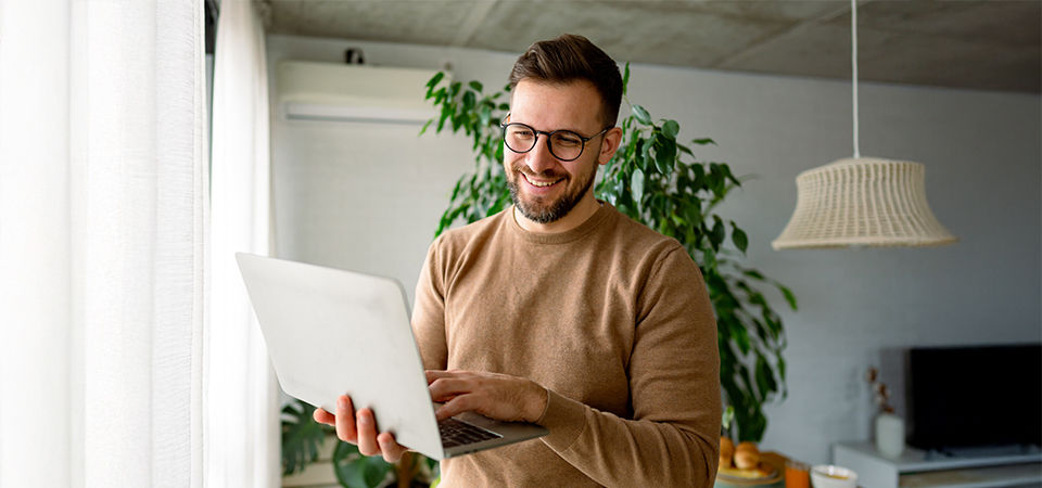 man on computer at home