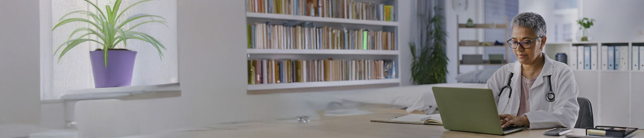 doctor on laptop in office