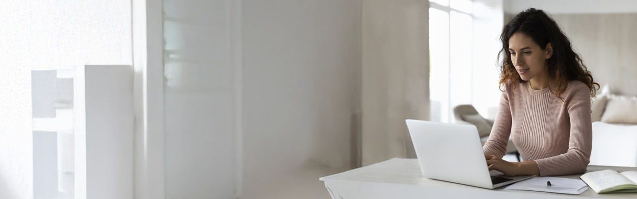 person on computer at home
