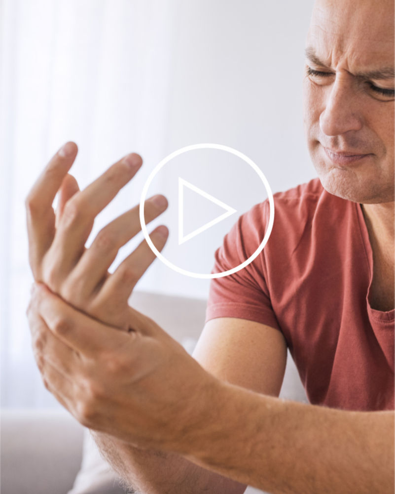 Man moving sore hand