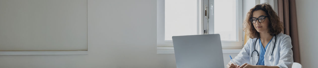 doctor on laptop in office