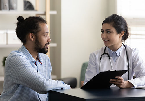 healthcare provider with patient in office