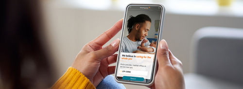 Smartphone mockup. Closeup of woman using mobile phone with empty screen at home