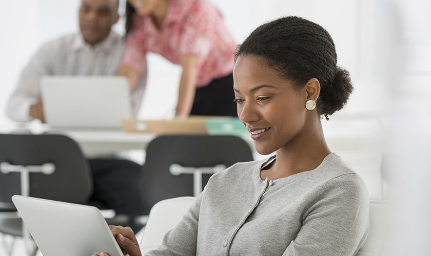 Girl looking at laptop