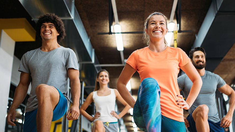 Patients stretching in a gym class