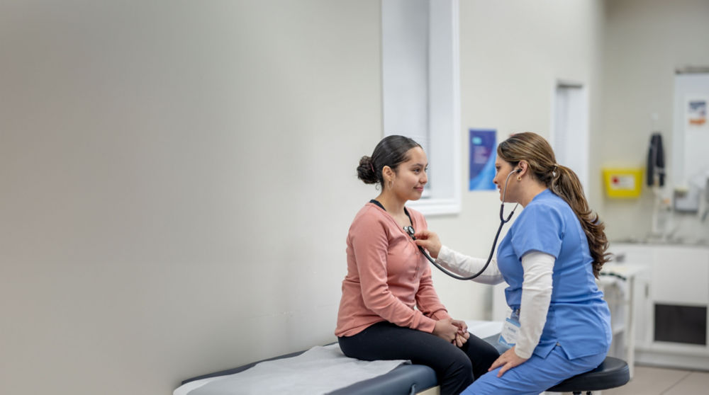 Doctor examining patient in new york medical office