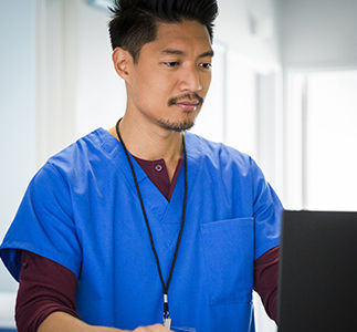 Health care provider on laptop