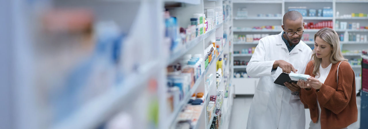 pharmacist talking to customer