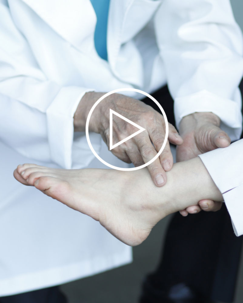Doctor looking at ankle